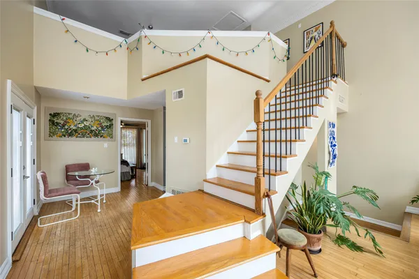 a view of entryway with wooden floor