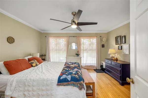 a bed room with a bed and a window