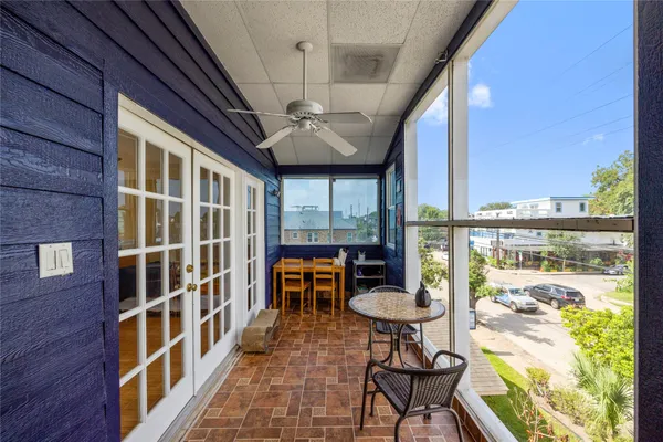 a view of a balcony with chairs
