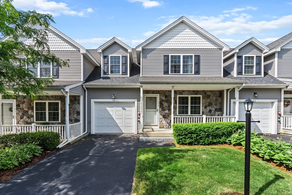 159 Allen Road, Unit 46 Billerica, MA 01821 - Photo 1 of 21 a front view of a house with a yard and garage