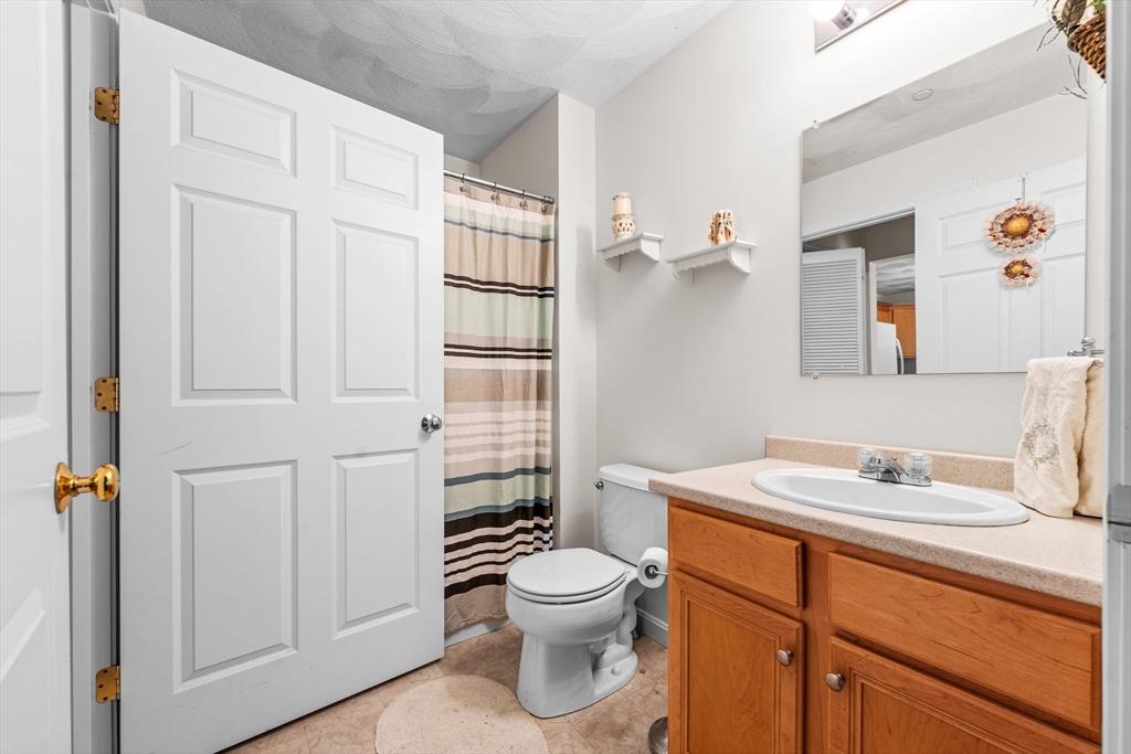 159 Allen Road, Unit 46 Billerica, MA 01821 - Photo 11 of 21 a bathroom with a sink toilet and shower