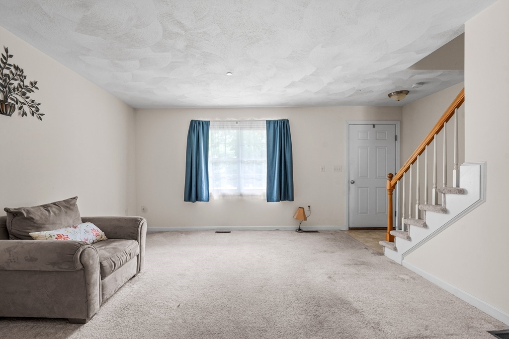 159 Allen Road, Unit 46 Billerica, MA 01821 - Photo 3 of 21 a living room with furniture and a window