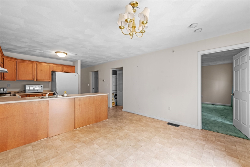 159 Allen Road, Unit 46 Billerica, MA 01821 - Photo 7 of 21 a view of a kitchen with a window