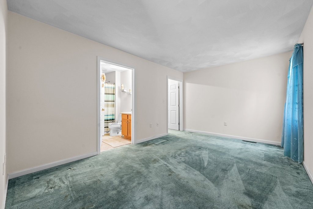 159 Allen Road, Unit 46 Billerica, MA 01821 - Photo 8 of 21 a view of an empty room and window