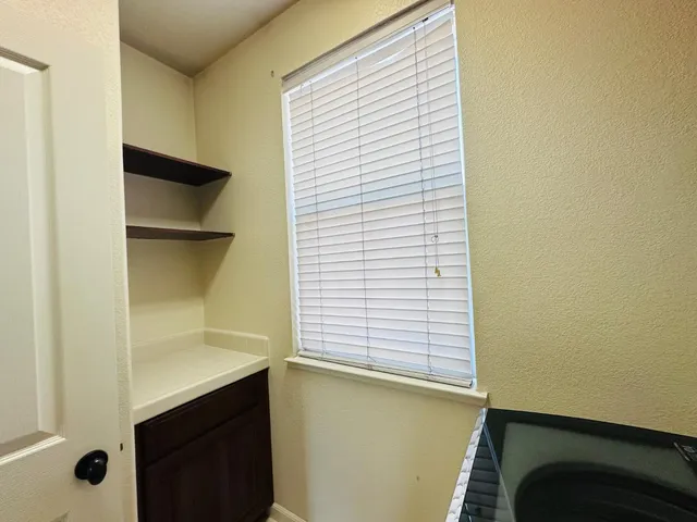 a view of a room with a window