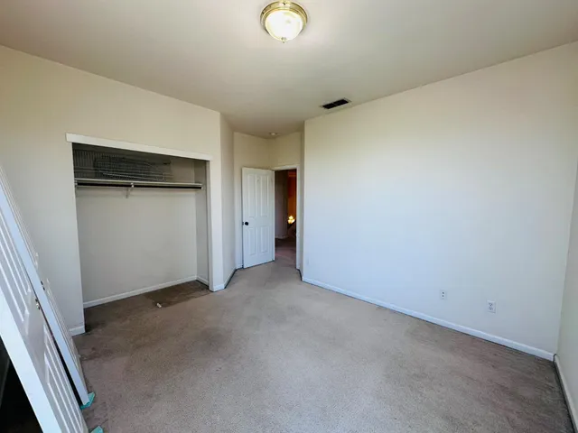 an empty room with closet