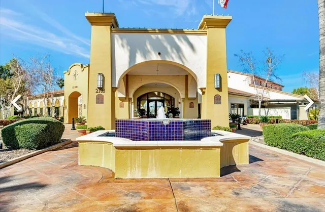 a view of building and with tub in front of main door