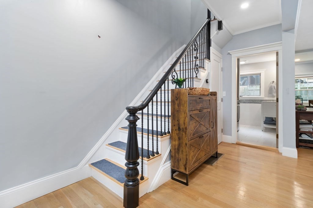 4 Goodwin Court Boston, MA 02127 - Photo 11 of 27 a view of entryway with wooden floor and stairs