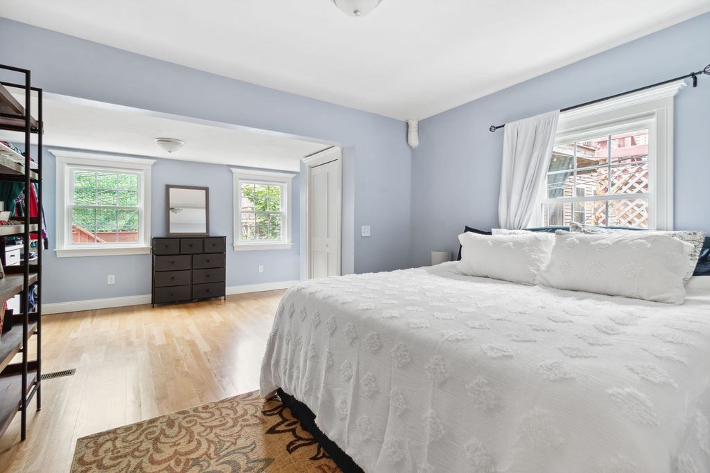 4 Goodwin Court Boston, MA 02127 - Photo 12 of 27 a bedroom with a bed and a large window