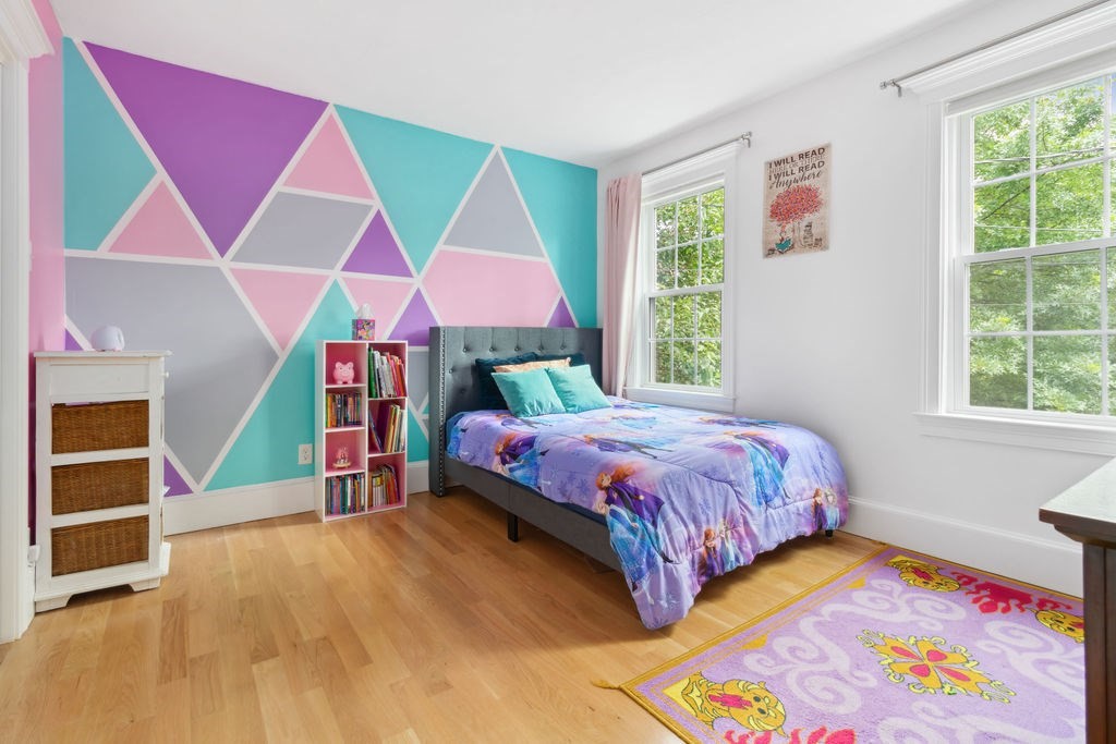 4 Goodwin Court Boston, MA 02127 - Photo 14 of 27 a bedroom with a bed and a window