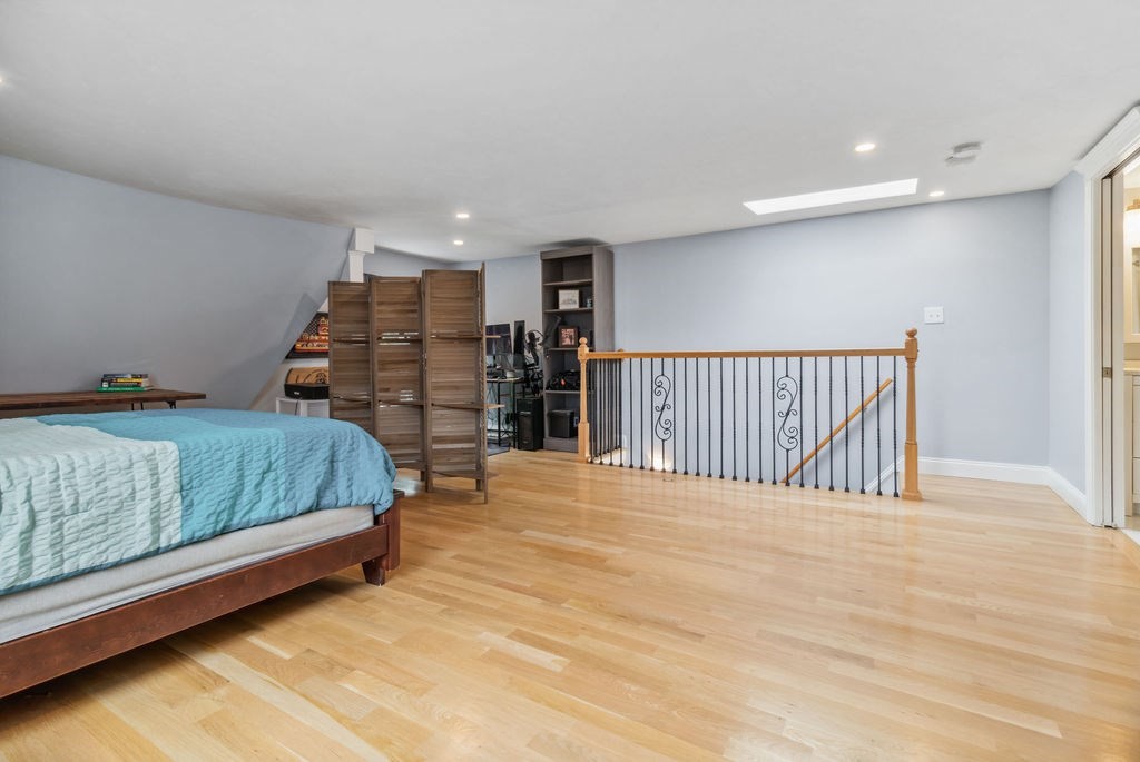 4 Goodwin Court Boston, MA 02127 - Photo 19 of 27 a bedroom with a bed and a walk in closet