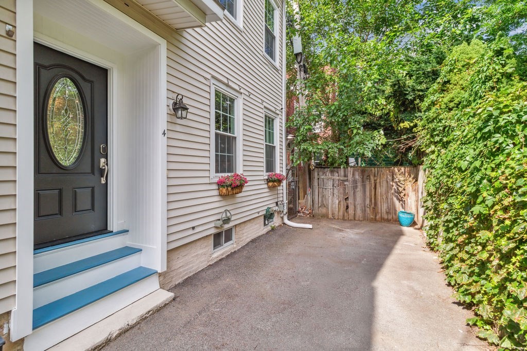4 Goodwin Court Boston, MA 02127 - Photo 22 of 27 a view of a house with a backyard