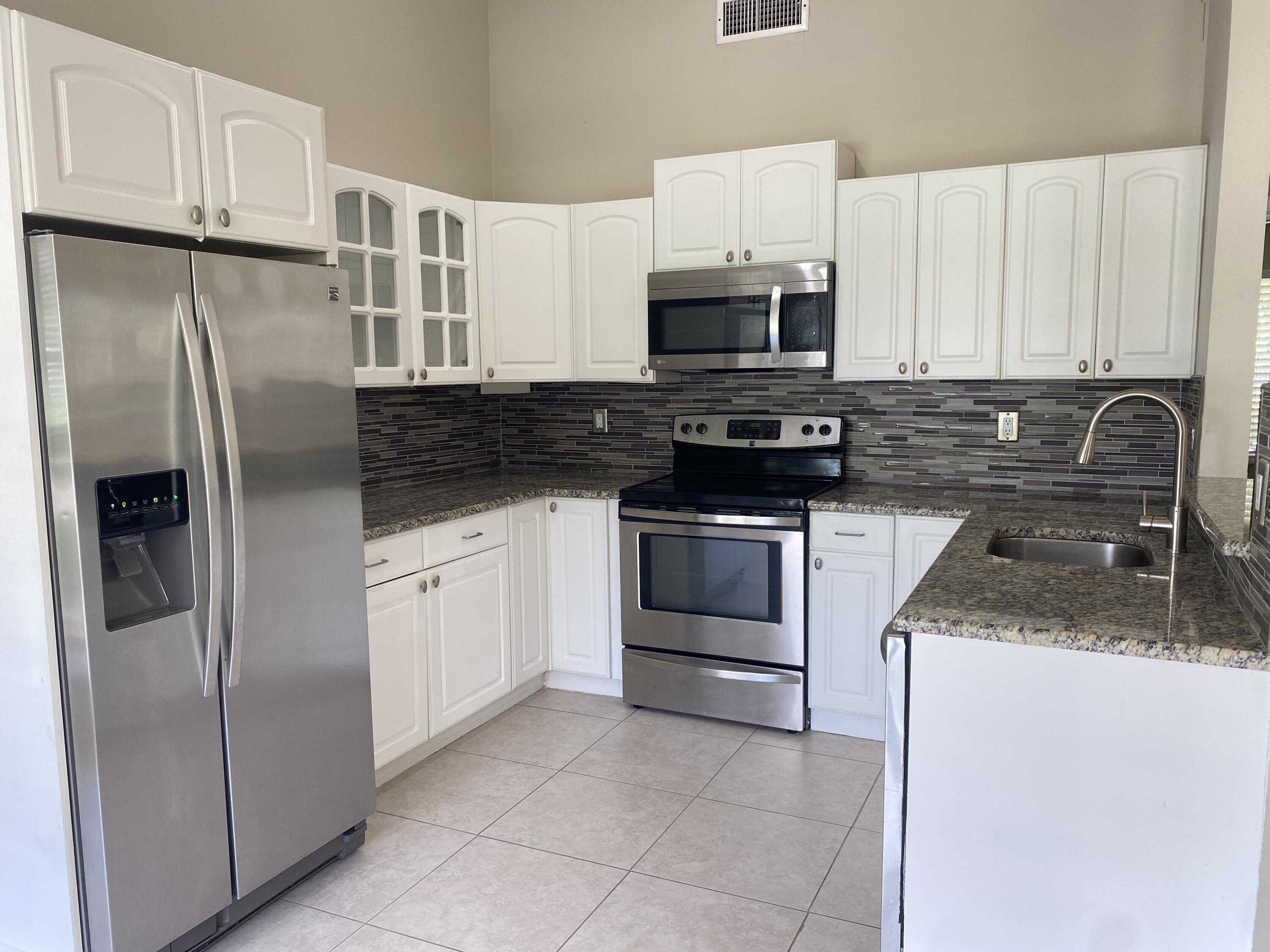 8233 Scenic Turn Boca Raton, FL 33433 - Photo 10 of 39 Updated Kitchen