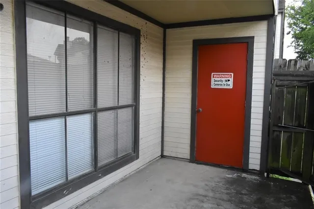 an empty room with mirror