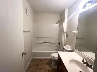 a room with a table and chairs