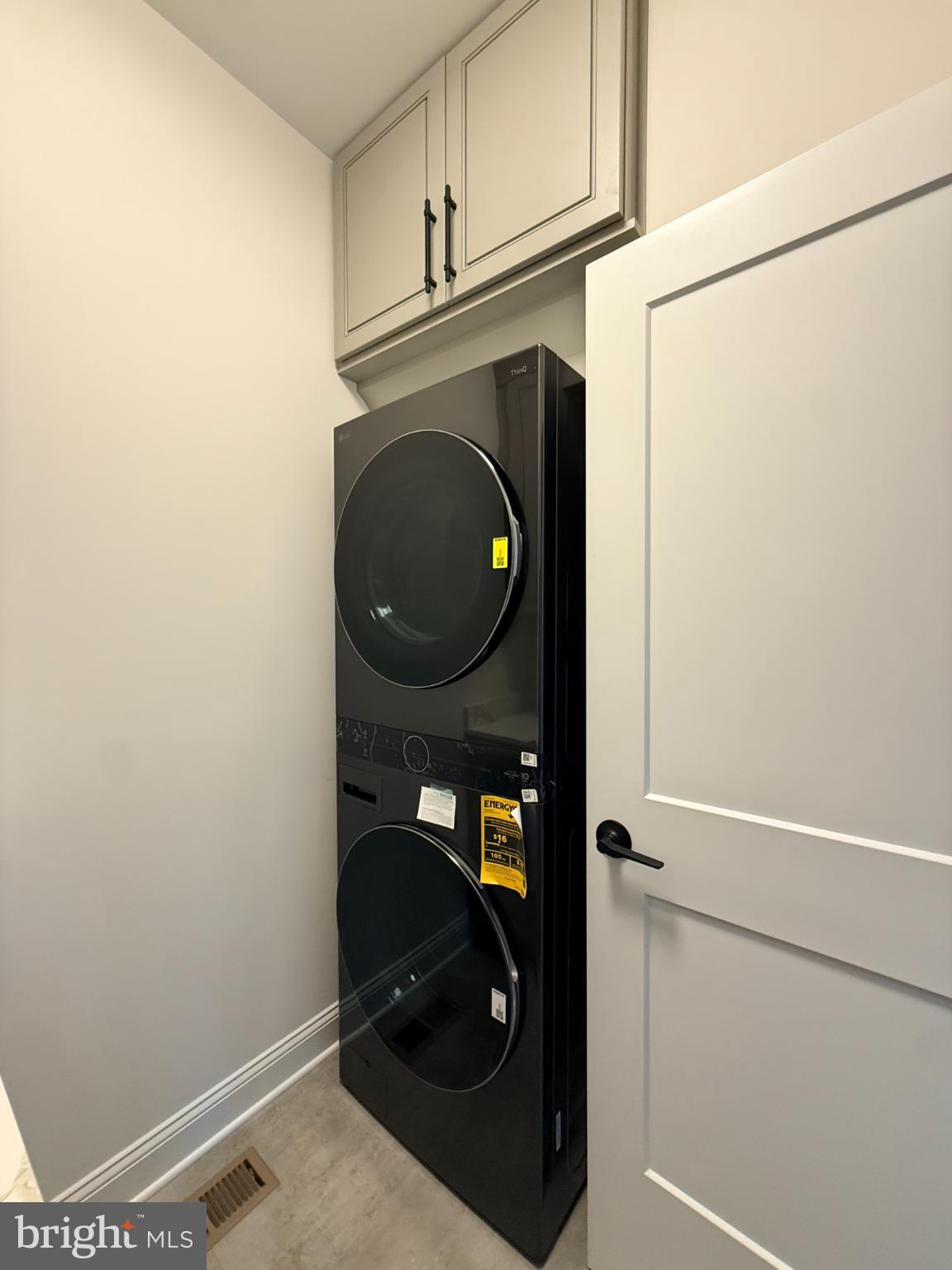 501 Gold Valley Road Locust Grove, VA 22508 - Photo 73 of 85 Sleek laundry setup in a modern space.