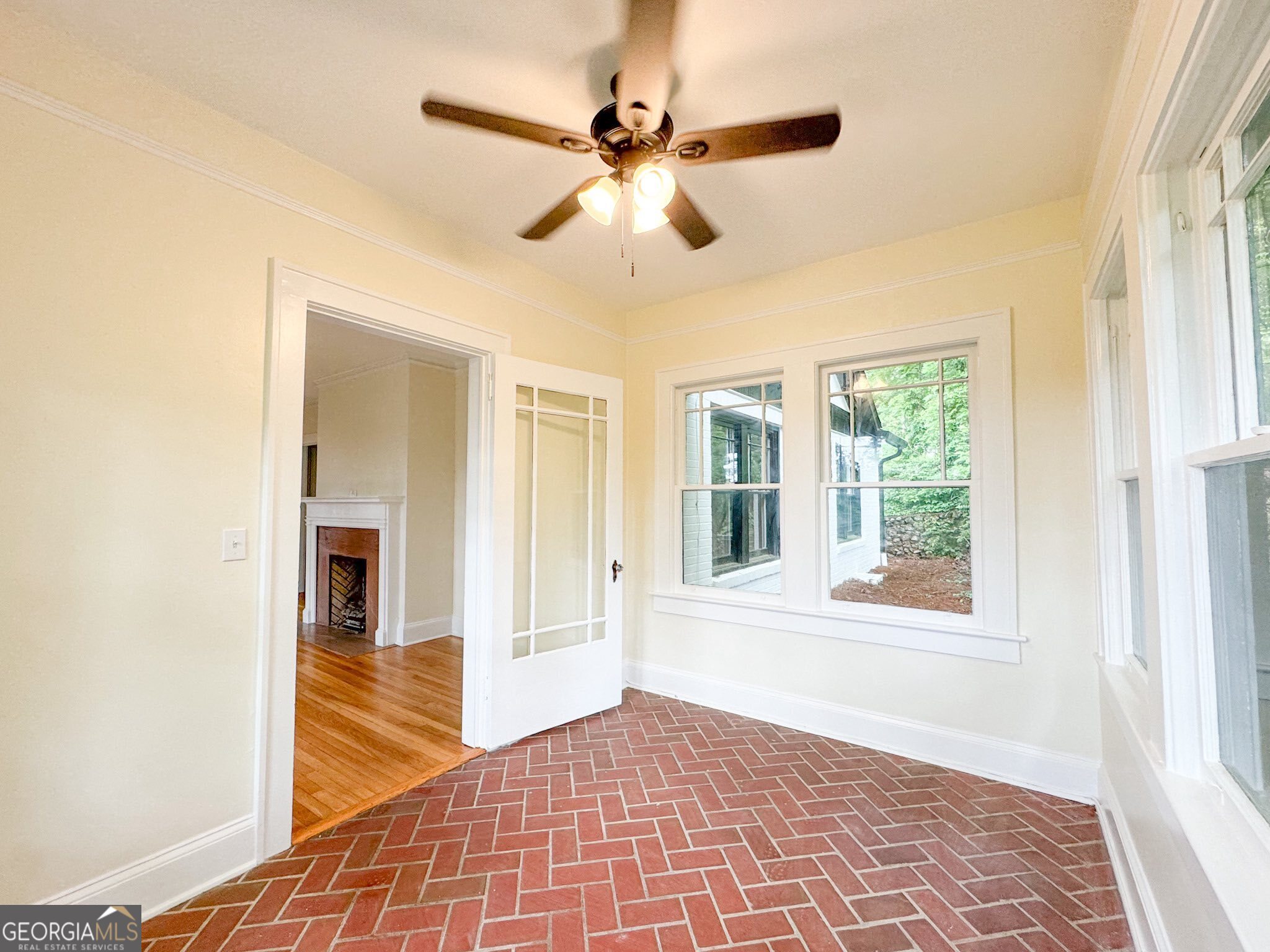 1 Vassar Drive Southeast Rome, GA 30161 - Photo 4 of 12 a view of a livingroom with a ceiling fan and window