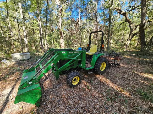 a backyard of a house with outdoor seating