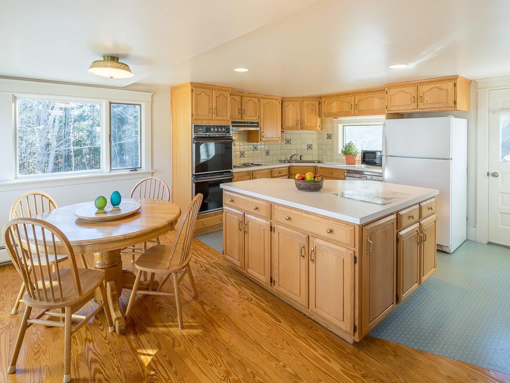 40 Jordan Pond Road Seal Harbor, ME 04675 - Photo 12 of 32 The Eat-in Kitchen has a large...