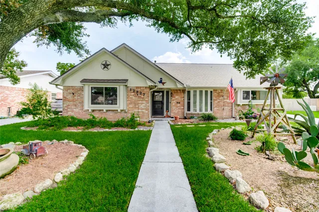 a front view of a house with yard