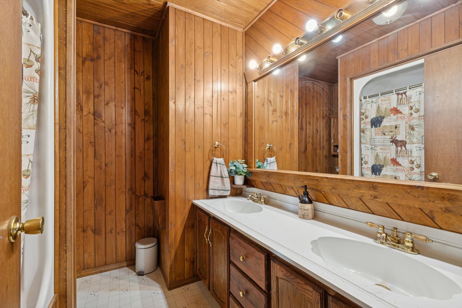 5430 Holly Road Fulton, IL 61252 - Photo 19 of 33 a bathroom with a sink double vanity and a mirror