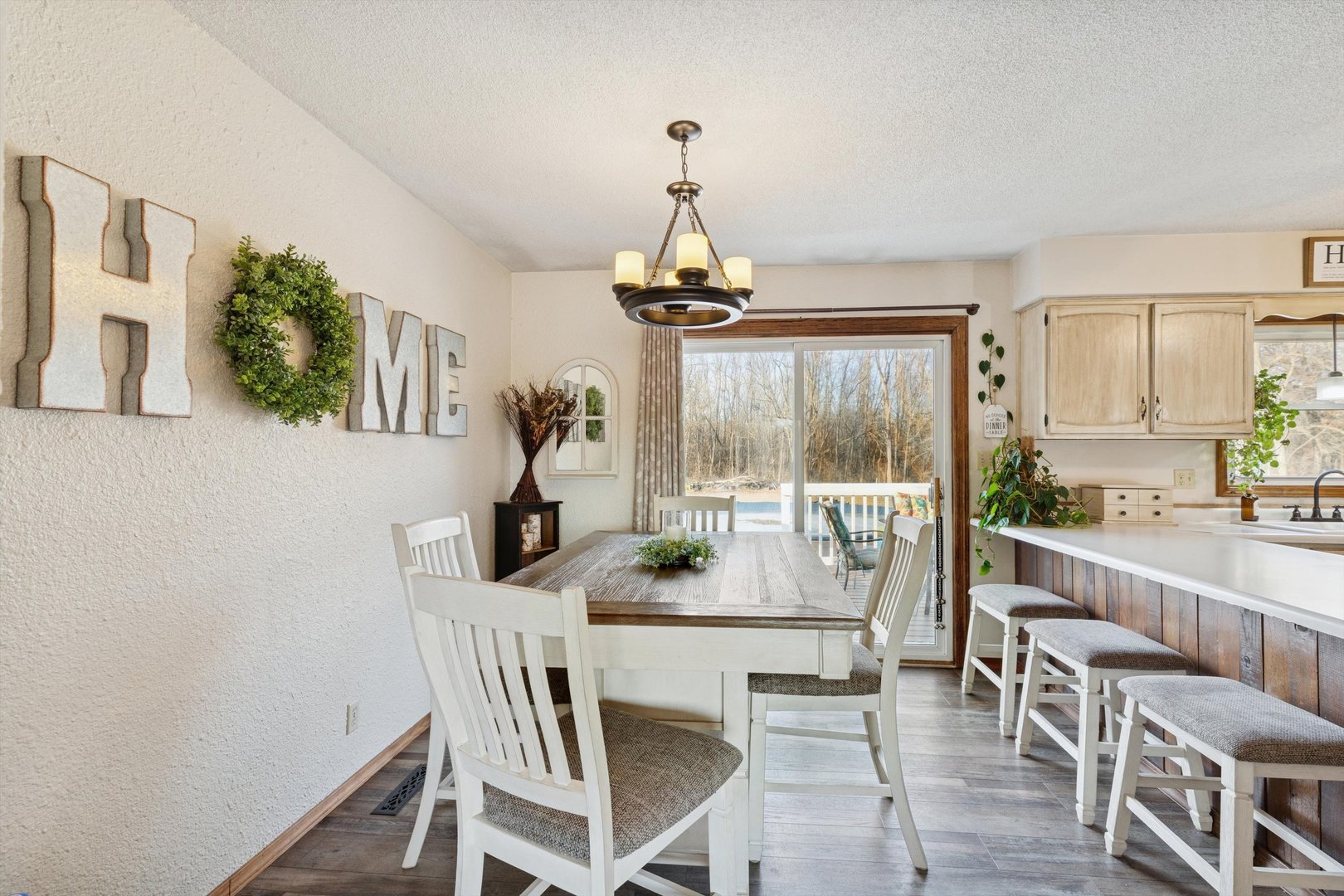 5430 Holly Road Fulton, IL 61252 - Photo 10 of 33 a dining room with furniture window wooden floor