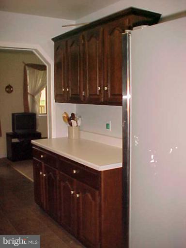 1909 Bayberry Road Edgewood, MD 21040 - Photo 14 of 28 a kitchen with a sink and a refrigerator