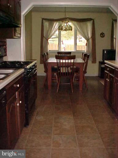 1909 Bayberry Road Edgewood, MD 21040 - Photo 20 of 28 a view of a dining room with furniture