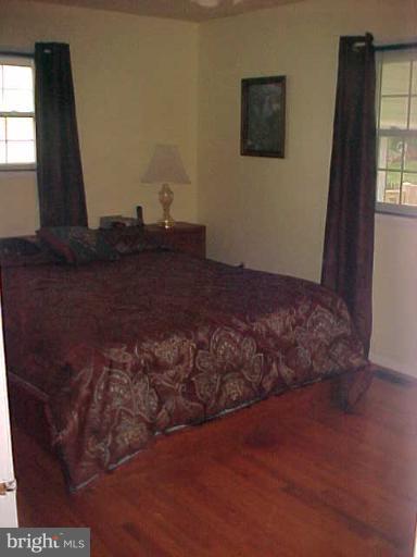 1909 Bayberry Road Edgewood, MD 21040 - Photo 3 of 28 a bed sitting in a bedroom next to a window