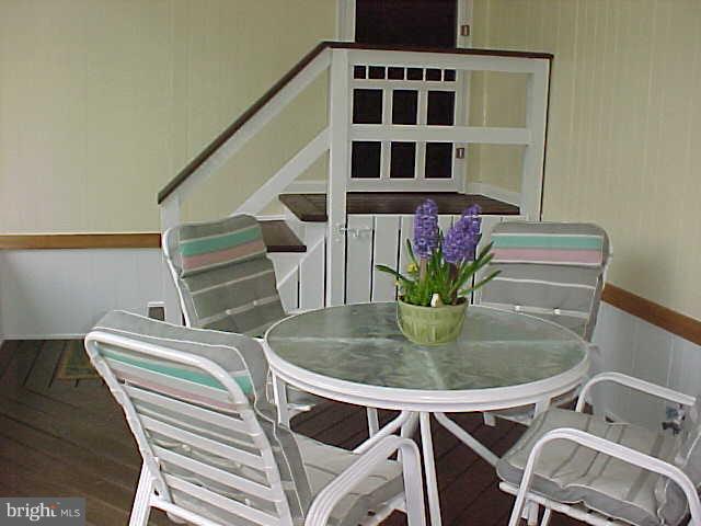 1909 Bayberry Road Edgewood, MD 21040 - Photo 22 of 28 a view of a dining room with furniture and wooden floor