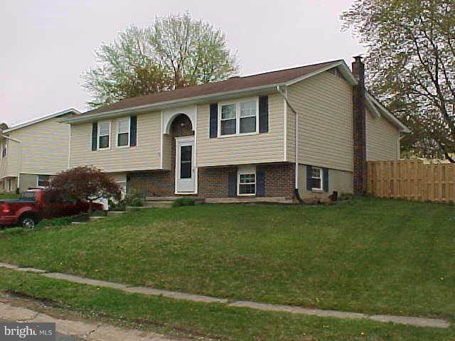 1909 Bayberry Road Edgewood, MD 21040 - Photo 26 of 28 a front view of a house with a garden