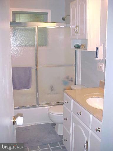 1909 Bayberry Road Edgewood, MD 21040 - Photo 6 of 28 a bathroom with a granite countertop sink a toilet and bathtub