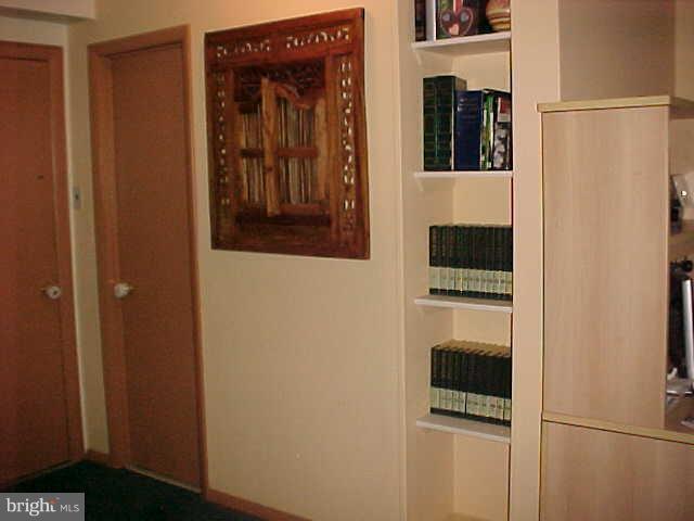 1909 Bayberry Road Edgewood, MD 21040 - Photo 8 of 28 a view of a hallway with wooden floor and cabinets