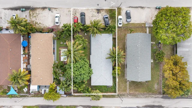 a front view of a house with yard