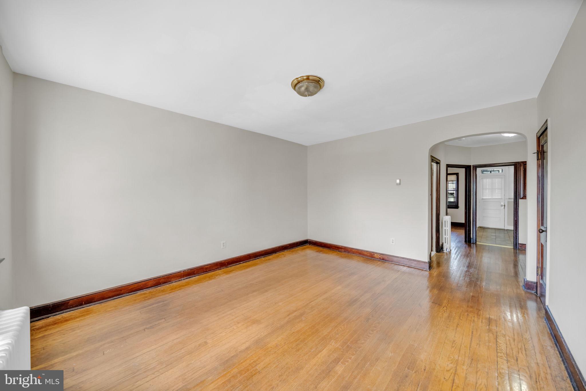 220 21st Street Northeast Washington, DC 20002 - Photo 13 of 26 a view of an empty room with wooden floor