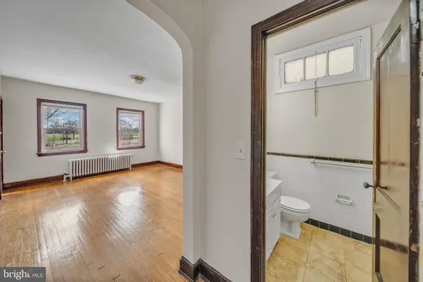 a bathroom with a sink toilet and vanity