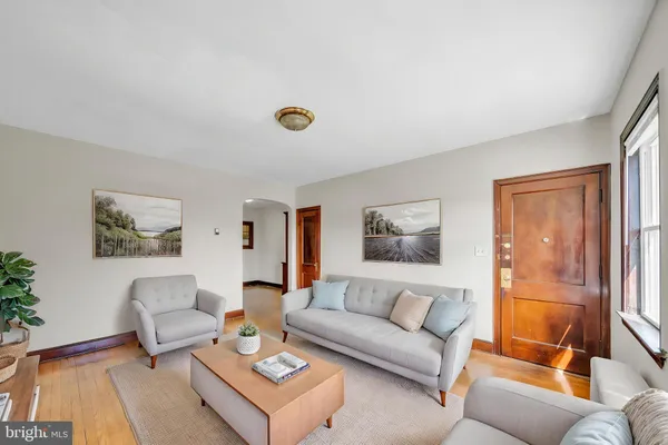 a view of a livingroom with wooden floor