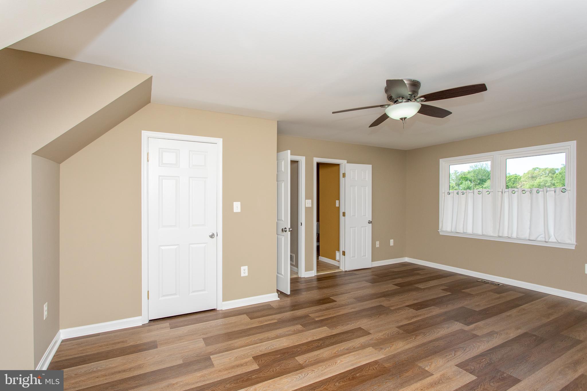540 Thunderbird Drive Lusby, MD 20657 - Photo 14 of 66 a view of an empty room with a window