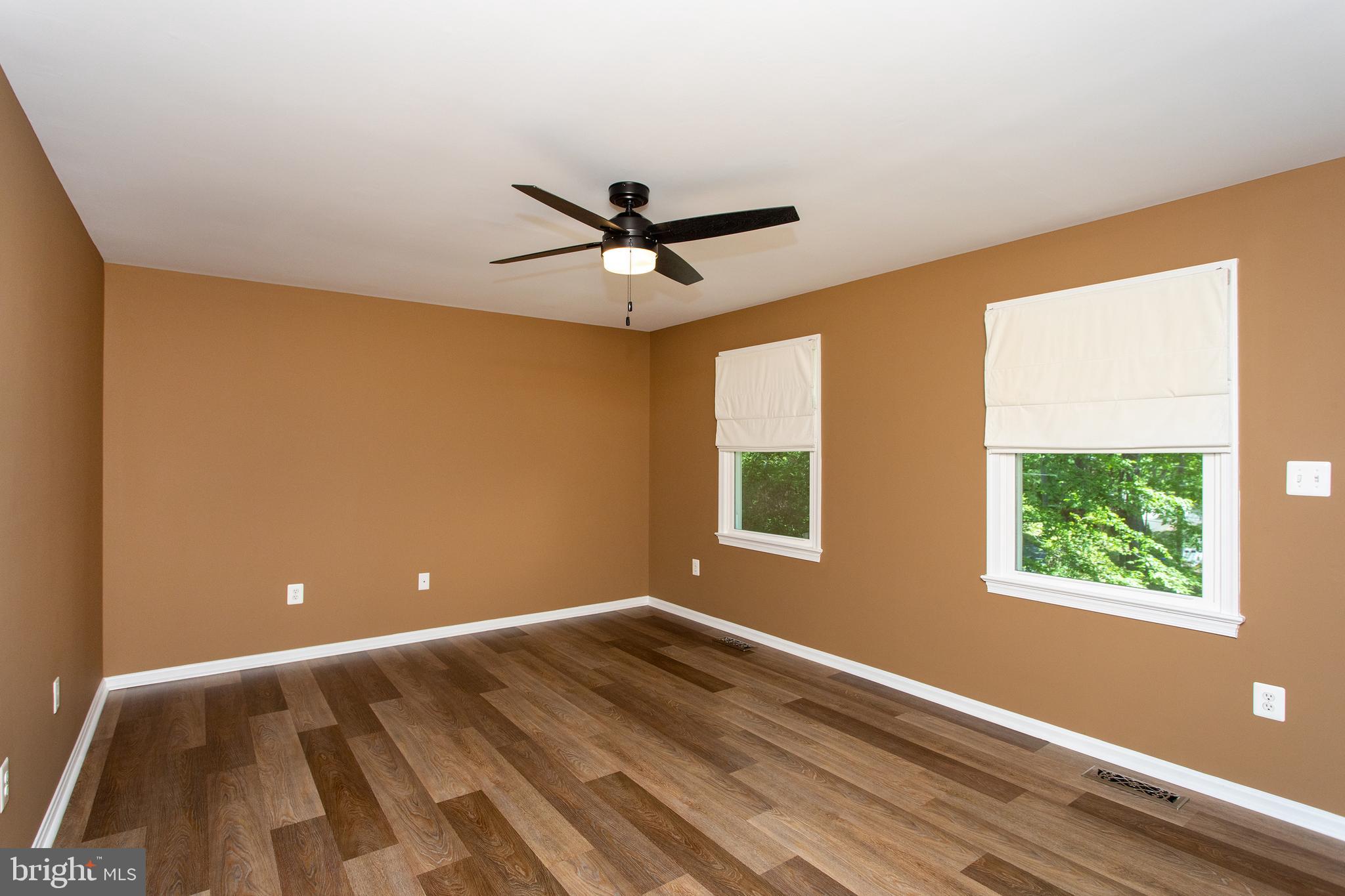 540 Thunderbird Drive Lusby, MD 20657 - Photo 25 of 66 a view of room with a ceiling fan and window