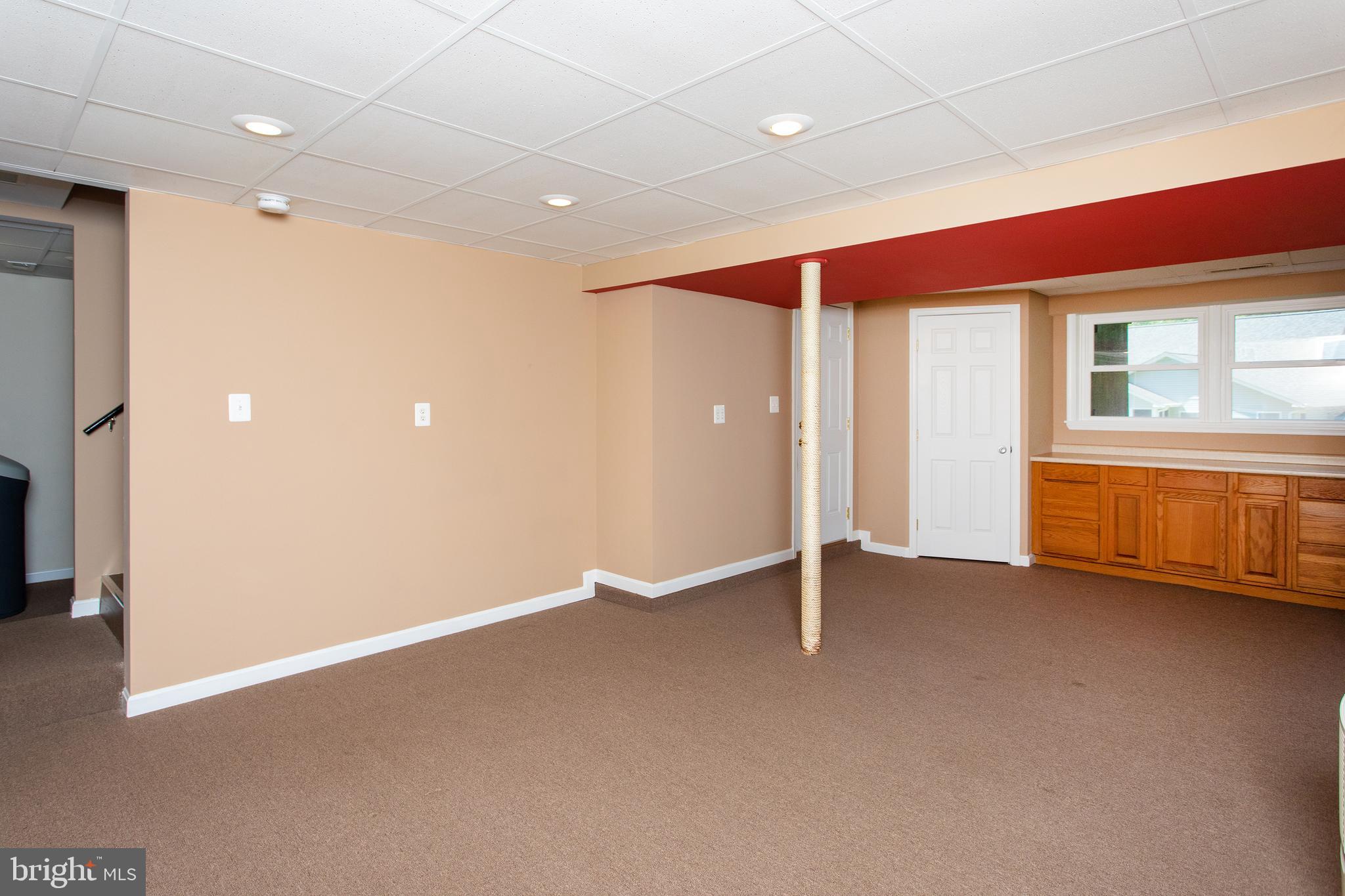 540 Thunderbird Drive Lusby, MD 20657 - Photo 42 of 66 an empty room with windows