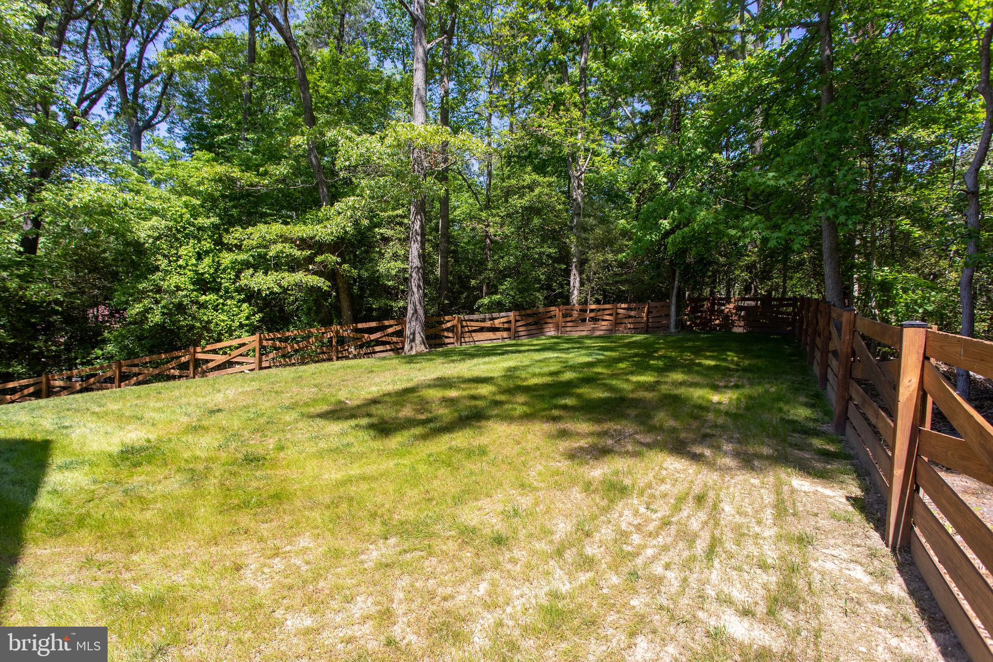 540 Thunderbird Drive Lusby, MD 20657 - Photo 51 of 66 a swimming pool with trees in the background