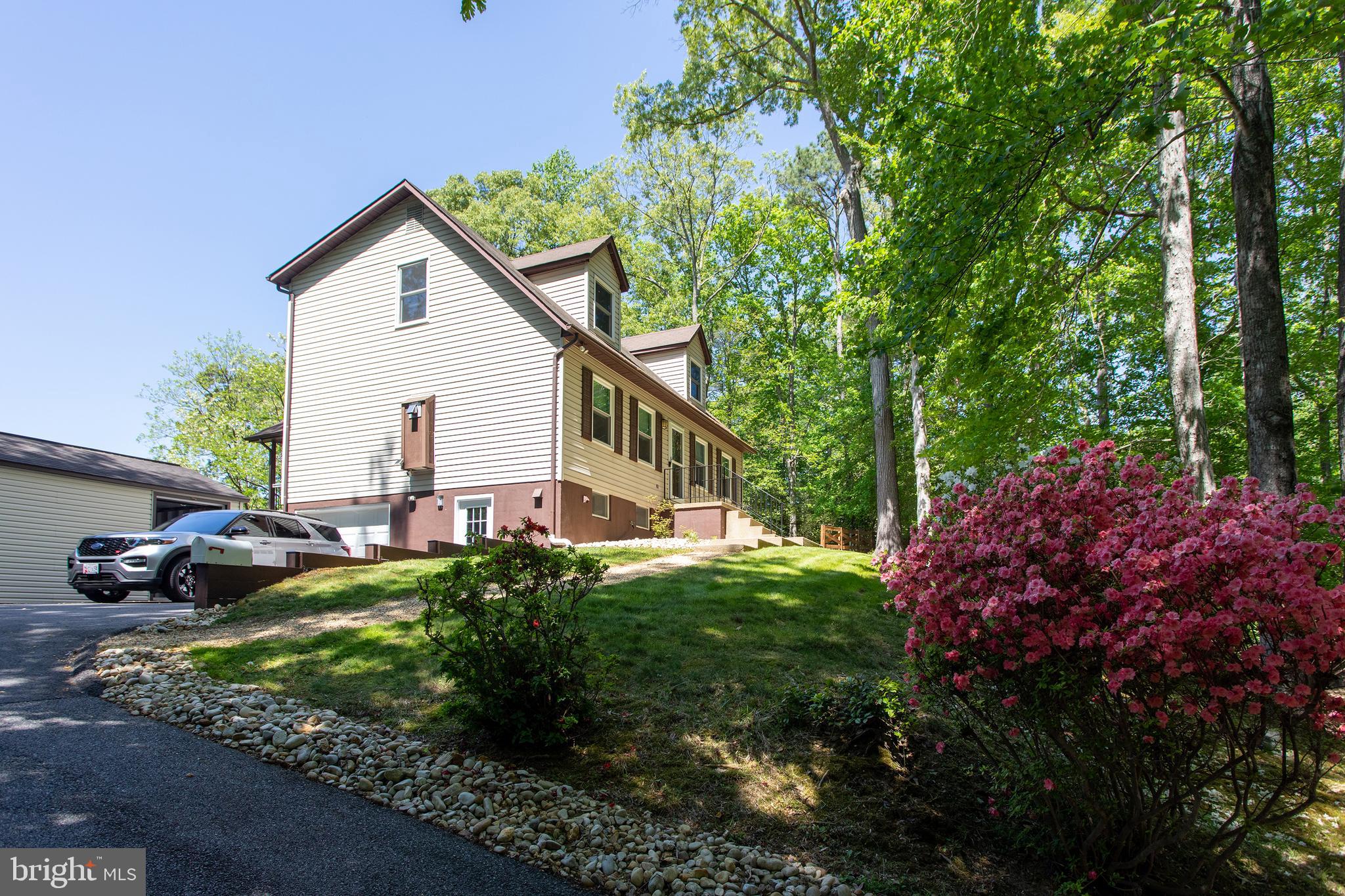 540 Thunderbird Drive Lusby, MD 20657 - Photo 61 of 66 a view of a house with backyard and sitting area