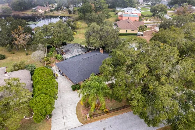 an aerial view of residential house with outdoor space