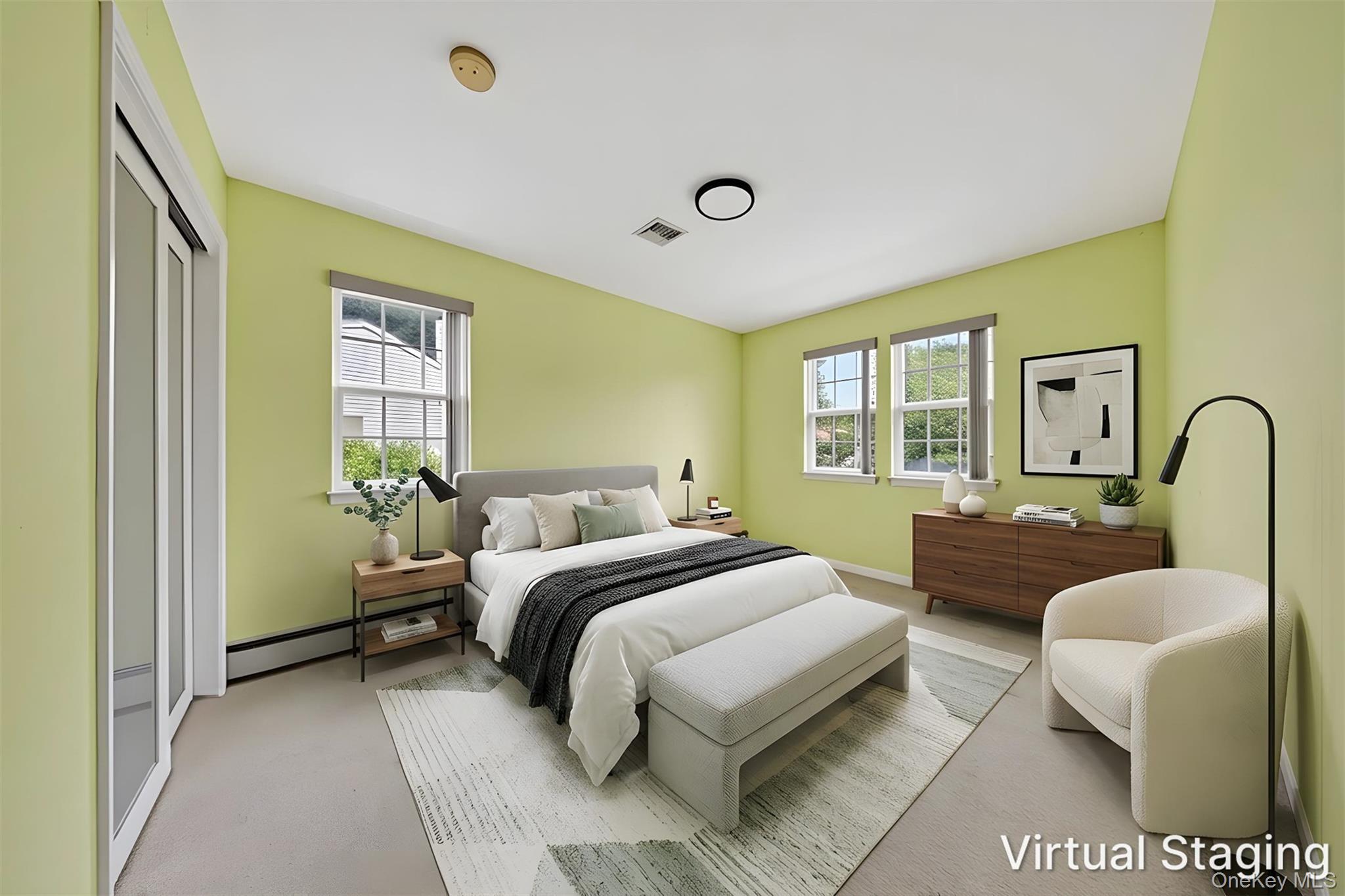 82 B Inwood Road Port Washington, NY 11050 - Photo 23 of 41 a bedroom with a bed couch and window