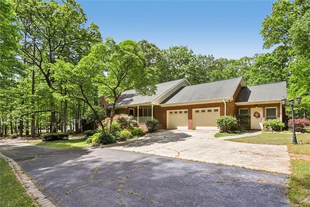 13597 Woolsey Road Hampton, GA 30228 - Photo 60 of 87 front view of a house with a street