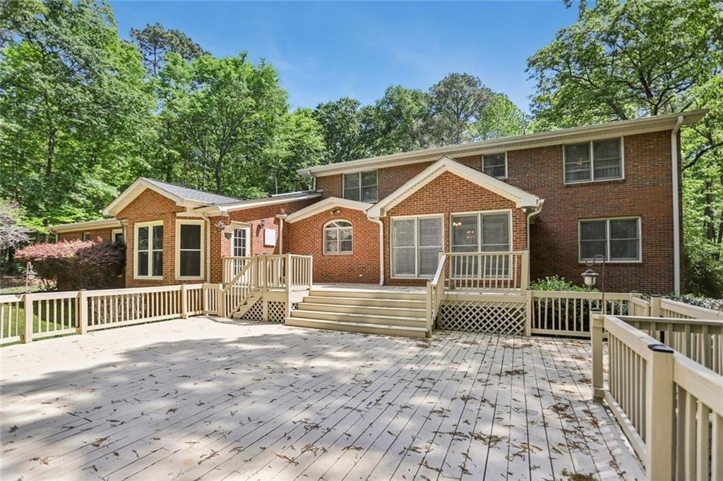 13597 Woolsey Road Hampton, GA 30228 - Photo 73 of 87 a front view of a house with a garden