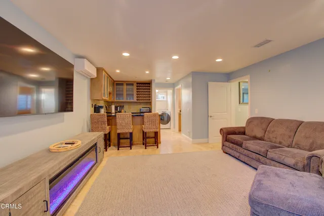a kitchen with stainless steel appliances granite countertop a sink and cabinets
