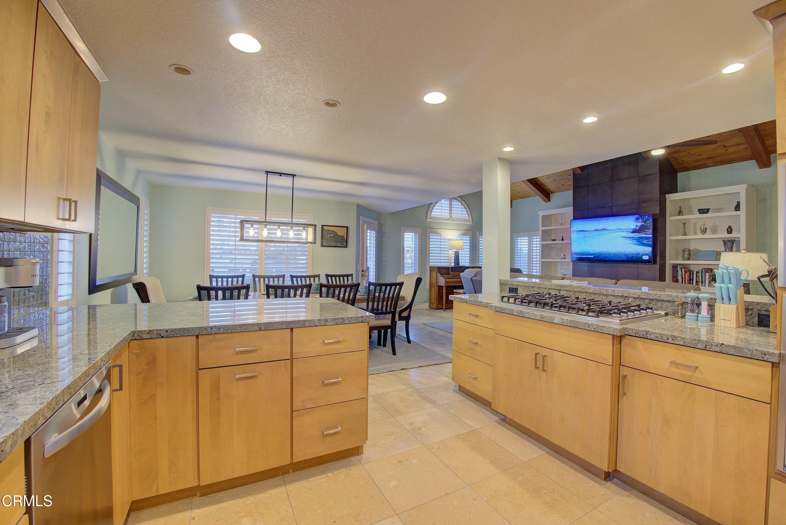 4117 Sunset Lane Oxnard, CA 93035 - Photo 8 of 33 a kitchen with stainless steel appliances granite countertop a stove and a sink