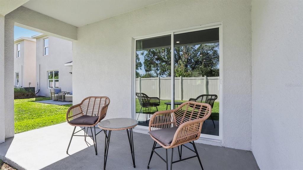 1046 Spotted Egret Loop Ruskin, FL 33570 - Photo 36 of 37 a view of a chair in wooden floor