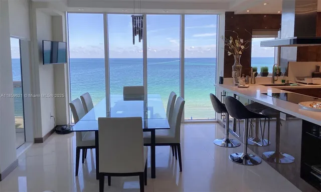 a view of a dining room with furniture